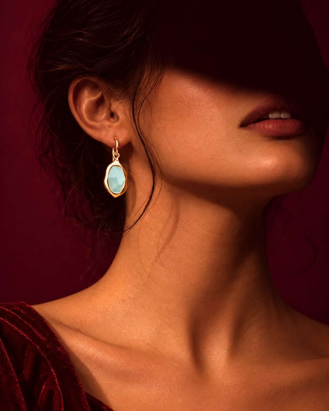 Model wearing crystal earrings